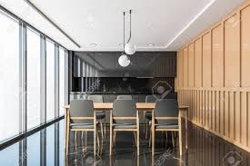 With contrasting blocks of black, white, and grey, this rug adds a touch of drama to any interior design, while its half. Interior Of Stylish Kitchen With Black Marble And Beige Walls Black Marble Floor Grey Countertops And Wooden Dining Table With Gray Chairs 3d Rendering Stock Photo Picture And Royalty Free Image Image