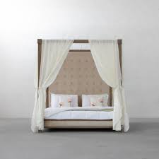 Or thread sheer fabric and string lights through two smaller hoops for instant coziness. Kingston Four Poster Bed