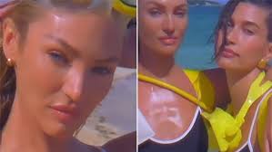 Hailey Bieber teams up with Candice Swanepoel to sizzle in swimsuits as  they plug BOTH their brands