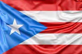 Closeup shot of the waving flag of puerto rico with interesting textures. Bandera De Puerto Rico Foto Gratis