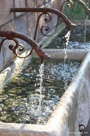 Running Water Can Be So Soothing That It Must Be Almost Therapeutic To Have A Rustic Fountain Like Water Features In The Garden Water Fountain Garden Fountain