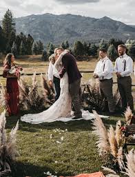 The wedding guest dress you wear will depend on the type of wedding you're attending. It Was All Good Vibes Crystals And Festival Seating For This Bohemian Mountain Wedding Green Wedding Shoes