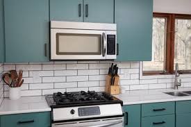 Balmy up the allowance with aged white or linen walls. Green Kitchen Cabinet Ideas