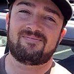 Tyler Rushing in grasp of deputy when shot by cop