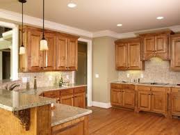 Consider painting a block of cabinets, such as the base cabinets, in a contrasting accent color to add interest. 17 Best Ideas About Honey Oak Cabinets On Pinterest Natural Top Kitchen Paint Colors Tuscan Kitchen Design Honey Oak Cabinets