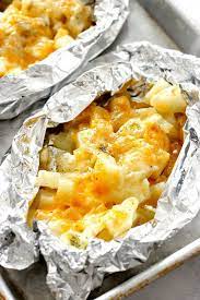 Cheesy Potatoes Foil Packs Recipe Easy And Delicious Side Dish That Can Be Baked In The Oven Or Cooked On The Foil Packet Meals Recipes Cooking On The Grill