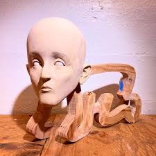 just after cooking the first time. Eyeballs were also cooked hard first,  then pushed into soft clay. I pretty much always cook the head hard first  before adding more clay for the