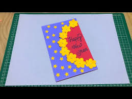 Fold the white sheet in half. Video Happy New Year Card