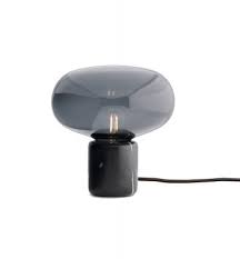 The tones of an autumn forest.the result is a poetic piece, a combination of tone and texture, dark and light. Karl Johan Table Lamp Tischleuchte New Works Eiche Opal Glas Eiche Gerauchert Opal Glas Weiss New Works 20310