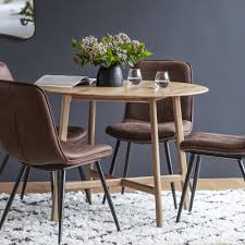 The room is complemented by natural light and is located on the lower ground floor of the building with access via stairs or lift. Langham Round Dining Table Interiors Online