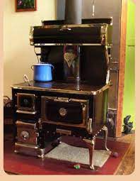 Grandma' s antique kitchen wood cooking stove. Amish Wood Cook Stoves Sarah S Country Kitchen Wood Stove Cooking Wood Stove Outdoor Cooking Stove