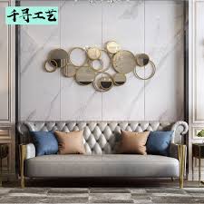 Photo courtesy of zillow celebrity homes. 207 08 Modern Luxury Wall Decoration Port Style Living Room Background Wall Hanging Point Metal Wall Decoration Creative Circular Mirror Wall Hanging From Best Taobao Agent Taobao International International Ecommerce Newbecca Com