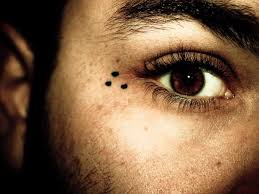8 Small Tattoos That Mean Big Things Gang Tattoos Dot Tattoos Face Tattoos