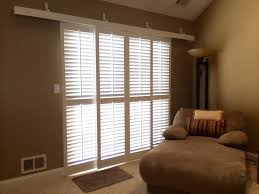 Barn door over sliding glass door. Rolling Shutters For Glass Sliding Doors