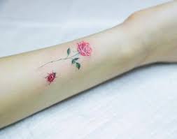 Click here for 50 beautiful rose tattoos + their symbolism. Small Pink Rose And Ladybug Tattoo On The Inner Forearm Tattoo Artist Sol Tattoo Lady Bug Tattoo Pink Rose Tattoos Small Tattoos