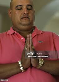 Cuban American Sylvia Lambert prays during a noon-time mass at the... News  Photo