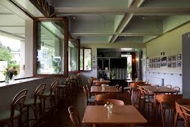 Two exterior patios offer members outdoor dining, very popular during the warm spring, summer. Gallery Of Merrion Cricket Club Taka Architects 14