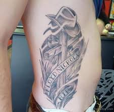 Barbed wire tattoos are chosen by people as it exhibits attitude and strength. Barbed Wire Cowboy Cross Tattoos Elegant Arts Tattoo