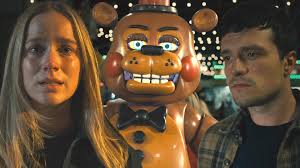 The video game-inspired horror saga continues, as Josh Hutcherson and  Elizabeth Lail return in 'Five Nights at Freddy's 2,' out Dec. 5.
