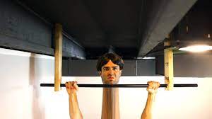 Talk about a piercing stare. Man With The Longest Neck In The World Breaks Pull Up World Record Youtube