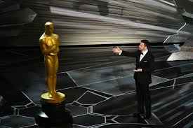 Florian zeller holds his oscars statuette after winning the best adapted screenplay for the the father at a screening of the oscars in paris, france april 26, 2021. U0zgnqjnbjecim