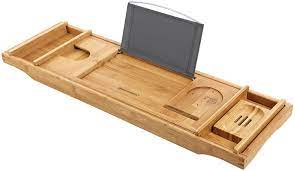 Discover bathtub trays on amazon.com at a great price. Songmics Extendable Bathtub Caddy Made Of Bamboo Bathtub Tray Adjustable Bathtub Board Bathtub Shelf With Drink Holder Book Support And Soap Holder Amazon De Home Kitchen