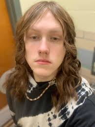 How to cut a teenager's long curly hair for high school?