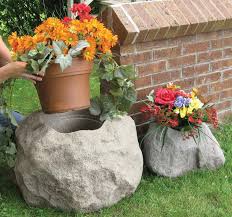And evidently the ones made for outdoor use the problem with keeping plants alive in pots and window boxes is that you have to water them gently and frequently, especially in the. Blossom Boulders Faux Rock Planters