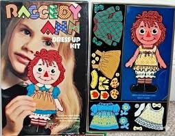 I got this Raggedy Ann a few weeks ago, but she did not have a very nice  dress so I made her this one.