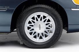 Image result for Medium Gold 1998 Town Car