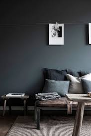 Charcoal Is A Soothing Paint Color For The Living Room Accent With Textures Of Linen And Sheepskin A Minimalism Interior Room Interior Minimal Interior Design