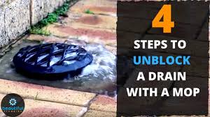how to solve blocked drain with a mop