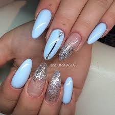 What we particularly like about this almond nails design is the number of different. Solin Sadek On Instagram Pastellbla Med Silverglitter Silverstripes Och Stenar Med Lite Inspo Fran Margar Pink Glitter Nails Blue Glitter Nails Blue Nails