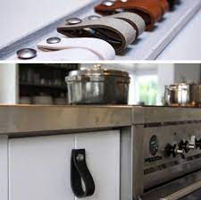 Check out the leather pull recessed : 10 Easy Pieces Leather Cabinet Hardware Remodelista