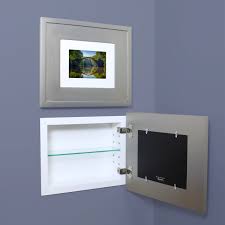 If you are looking for something that looks less like a cabinet and more like a mirror on the wall, consider a size or shape that is nontraditional or includes a decorative frame. Landscape Silver Contemporary Recessed Picture Frame Medicine Cabinet 14 W X 11 H