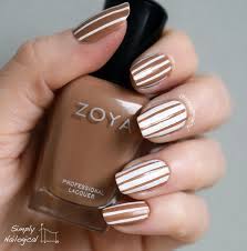 The middle fingers are flanked by rich golden brown glittered topcoats for the perfect touch to a lovely nail job that positively. Tan White Stripes Nail Art By Simplynailogical Nailpolis Museum Of Nail Art