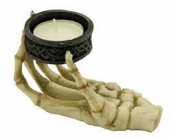 Maybe you would like to learn more about one of these? Skeleton Hand Candle Tea Light Holder