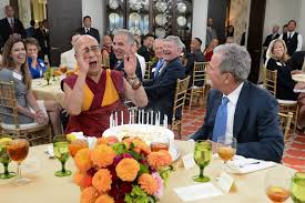 His Holiness the Dalai Lama laughing ...
