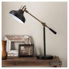 Portable and easy to install, they simplify lighting your space and add a visual focal point to the room. Threshold Crosby Schoolhouse Black Metal Table Lamp