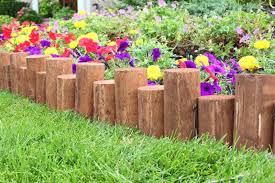There are a great variety of edging materials to choose from: 100 Garden Edging Ideas That Will Inspire You To Spruce Up Your Yard Small Garden Fence Garden Edging Wood Garden Edging