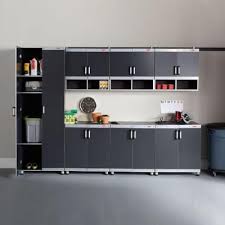 The rubbermaid fast track wall system allows you to configure and customize the wall panels to fit your particular garage. Rubbermaid Fasttrack Garage Laminate Cabinet Set In Black Silver 7 Piece Ftcs10007 The Home Depot Laminate Cabinets Garage Workshop Organization Garage Workshop