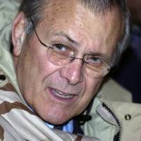 US Secretary of Defense Donald H. Rumsfeld, right, is briefed by Colonel  (COL) Frank Wismer, US Army (USA), Coalition Provisional Authority (CPA)  Chaplain, as they tour the ruins of Babylon in Al
