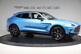 Image result for Concours Blue 2024 Aston Martin