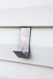 How To Hang Decor On Siding Outside House Decor Patio Wall Decor Outdoor Wall Decor