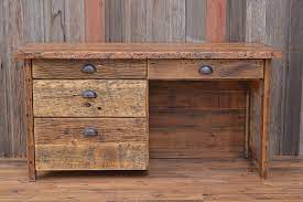 Solid barn wood desk made with reclaimed wood and iron pipe legs. Barnwood Writing Desk Back At The Ranch