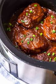 Crock Pot Pork Chops Cooked Hands Free In The Slow Cooker With Barbecue Sauce Pork Chop Recipes Crockpot Bbq Pork Chops Cooking Boneless Pork Chops