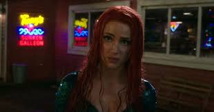 Where aquaman and fantastic beast were scheduled back to back. Aquaman Star Amber Heard Says She Had To Be Vacuum Sealed Into Mera S Suit Moviefone