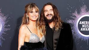 Klum later married rocker tom kaulitz in august 2019. Heidi Klum Kisses Husband Through Glass Amidst Coronavirus Scare Hollywood Life