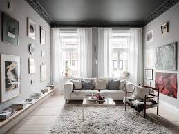Painting an exposed basement ceiling black the cozy clarks. A Dark Green Painted Ceiling In An Art Filled Apartment The Nordroom