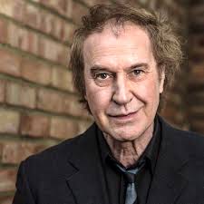 1978, Ray Davies and Hilly Kristal (owner CBGB's ) and the Kinks PR and  assistant my friend Barbara Bothwell R.I.P. having a chat Photo by Dan the  Fan or me. We were